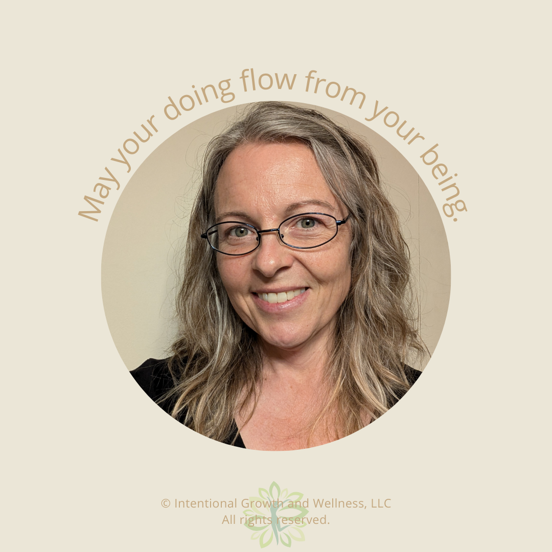 Picture of Laura, a woman with blonde hair, wearing glasses